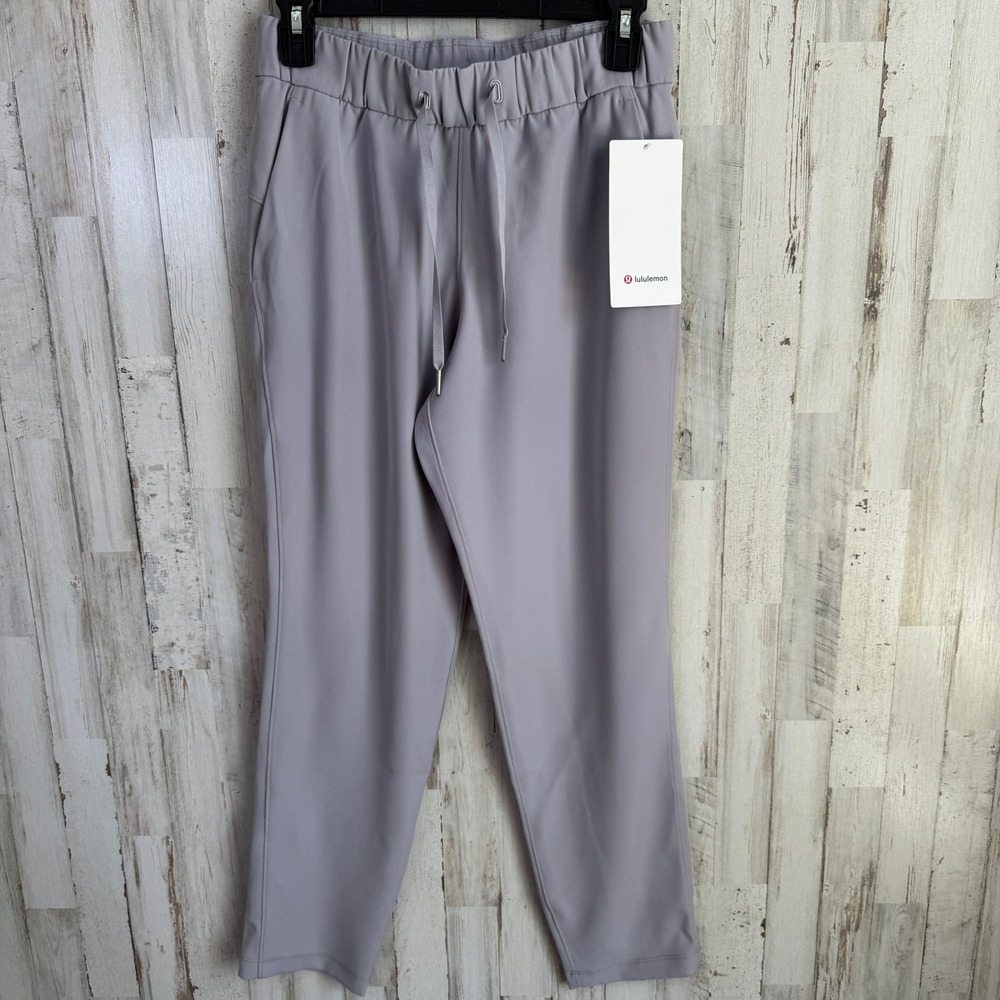 NWT Lululemon Pant Womens 4 Silver Grey On the Fly 7/8 Woven 27" Inseam LW5BPMS